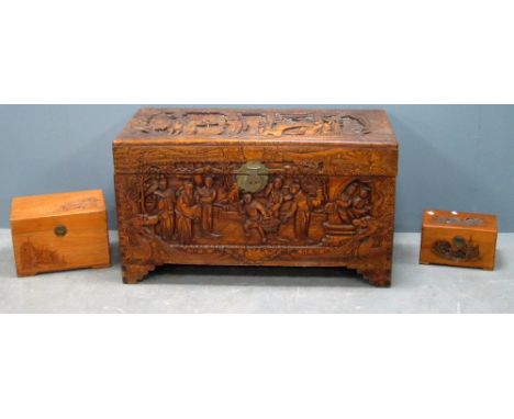 Carved camphorwood trunk, gilt framed mirror and two similar boxes 