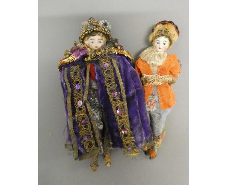 Two bisque shoulder head doll's house dolls, both with moulded hair, painted features and bisque lower limbs, dressed in Roya