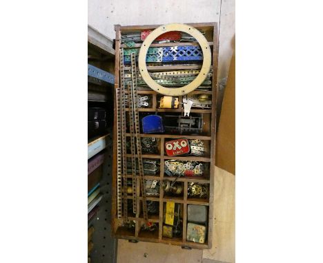 Large quantity of pre and postwar Meccano parts, all items in well used condition, contents include plates, strip, wheels, ty