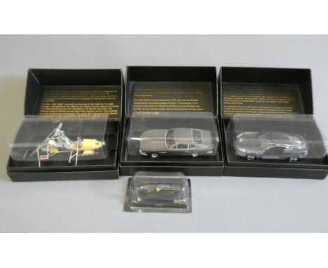 Four Corgi James Bond vehicles comprising Q boat, Aston Martin V8, Aston Martin DBS and little Nelle Auto Gyro, all items box