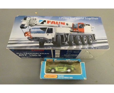 Tadano All Terrain crane truck ATF 100-5, boxed ,good and Matchbox K-70 Porsche, boxed, fair (Est. plus 24% buyer's premium i