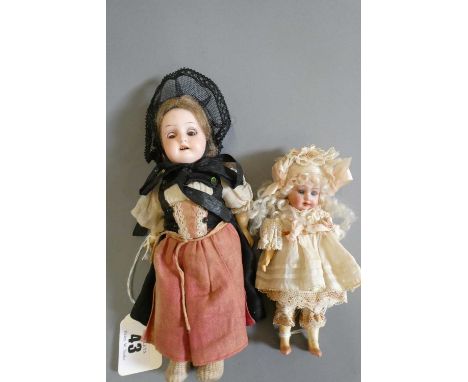 Two small Armand Marseille bisque socket head dolls, comprising an 8" 390 12/0 with brown glass sleeping eyes, open mouth, te
