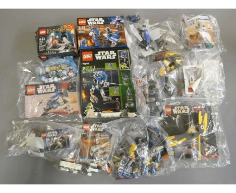 A quantity of boxed and loose Star Wars Lego including 75002 and 7914 boxed, together with 7913, 7669, 7668 and 30051 loose, 