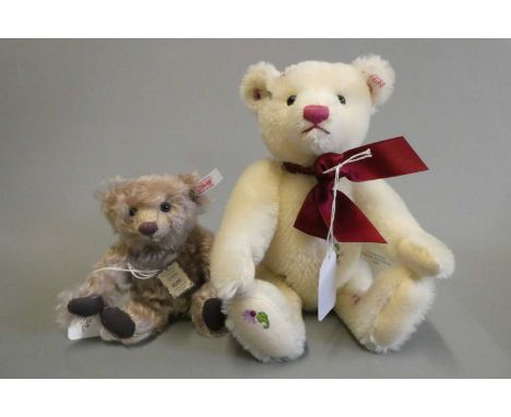 Steiff Sommer 2009 teddy bear, with floral embroidered plush, red ribbon, card label, ear button and ear label, 10" long, tog