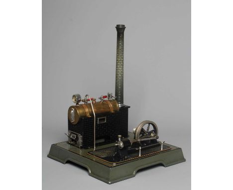 Marklin stationary steam engine sprit fired boiler with reversing single cylinder engine on tin enamelled base with burner, e