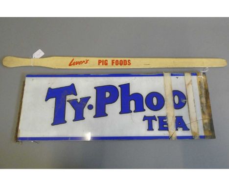 A Lever's "PIG FOODS" advertising pig guiding stick, 36" long, together with a glass Ty-Phoo tea sign, 28" x 10" (2) (Est. pl