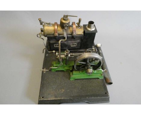 Marklin stationary steam engine comprising large single cylinder reversing engine with water pump, boiler with water gauge, w