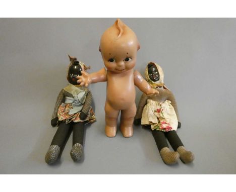 Three vintage dolls, comprising a 10 1/2" Kewpie doll with jointed shoulders and painted features, and two 12 1/2" lady dolls