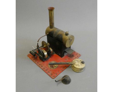 Bowman twin oscillating cylinder steam engine with sprit burner and funnel. Shows signs of use, minor rust to base. Fair (Est