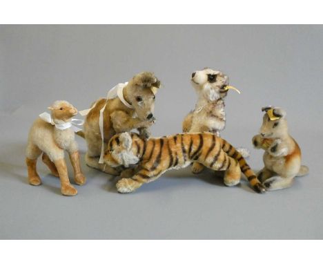 Five mostly Steiff animals, mostly vintage, including a tiger, a meercat, a camel and two kangeroos (Est. plus 24% buyer's pr