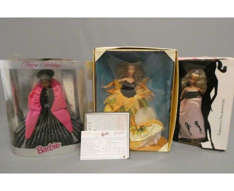Three boxed Barbie dolls comprising a Happy Holidays doll, a Van Gogh limited edition and a Timeless Silhouette doll (Est. pl