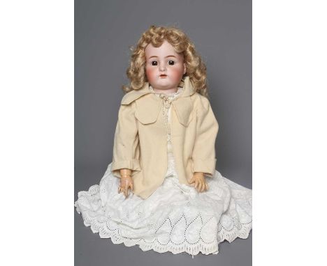A Kammer &amp; Reinhardt S&amp;H bisque socket head doll, with brown glass sleeping eyes, open mouth, applied teeth, pierced 