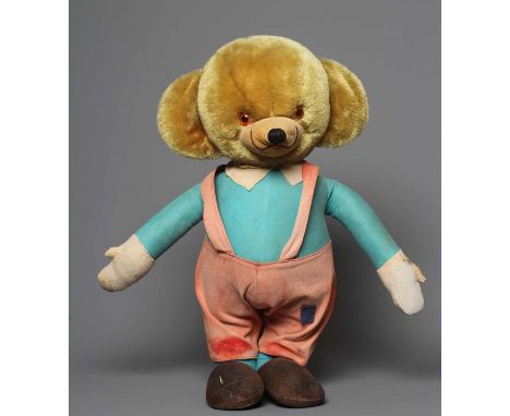 A large Merrythought Mr Twisty cheeky bear, with ear bells, original outfit and label to foot, 22 1/2" tall (Est. plus 24% bu