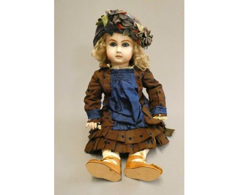 A reproduction Jules Nicholas Steiner bisque socket head doll, with blue glass fixed eyes, closed mouth, pierced ears, blond 