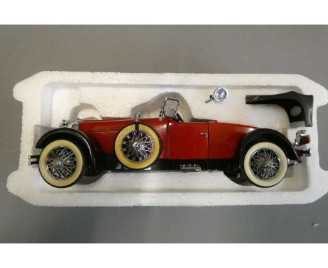 Franklin Mint 1:24 scale 1928 Stutz Boat Tail Speedster in red. Some minor paint blemishes, good+ (Est. plus 24% buyer's prem
