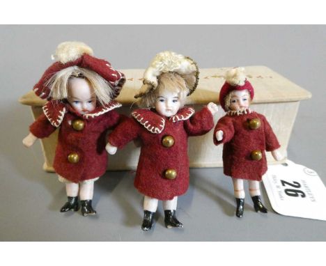 A pair of all bisque doll's house dolls with painted features and shoes, straight legs, jointed necks, shoulders and hips, to