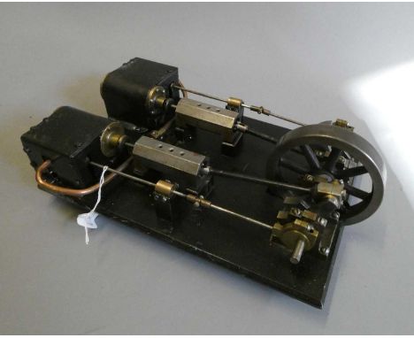 Large twin cylinder horizontal steam engine constructed from steel fabrications with cast fly wheel, non reversing engine fin