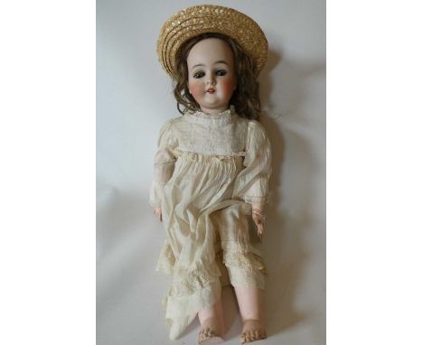 A Queen Louise bisque socket head doll with blue glass sleeping eyes, open mouth, teeth, wood and composition jointed body, c