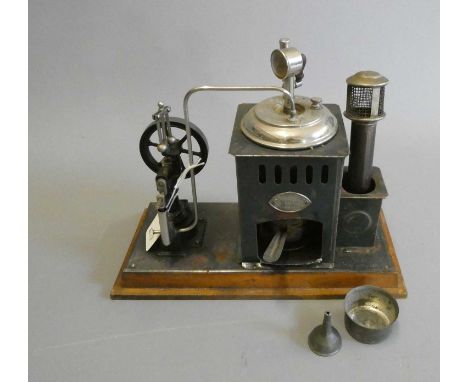 Ernst Plank for Gamage’s stationary steam engine, small vertical boiler with pressure gauge and whistle single cylinder oscil