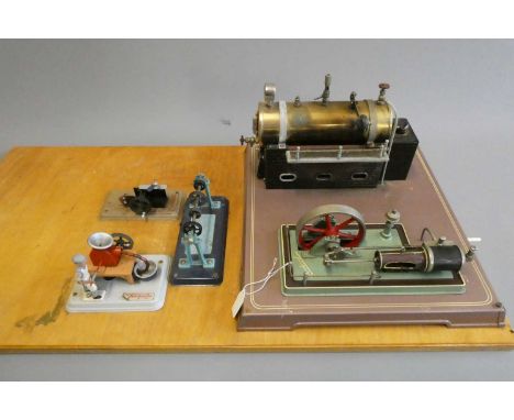 Fleischmann 130/2 spirit fired steam engine with workshop accessories, some rusting to boiler support, one of the workshop to