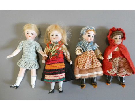 Four doll's house dolls, comprising two all bisque, one with jointed neck and one with jointed shoulders and hips, the other 