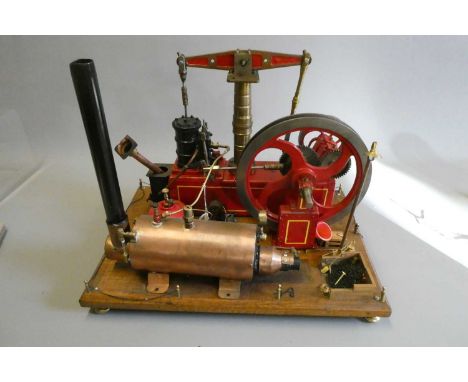 Large beam engine model with gas fired boiler, boiler fitted with safety valve, pressure gauge and water gauge. Beam engine i