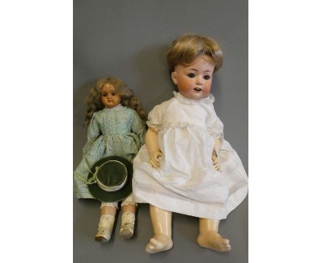 Two vintage dolls, comprising a 23 1/2" Heubach Koppelsdorf 321 8 bisque socket head doll with blue glass sleeping eyes, open