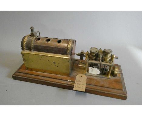 Brass twin cylinder boat engine with copper boiler safety valve, displacement lubricator and twin oscillating cylinders, fixe
