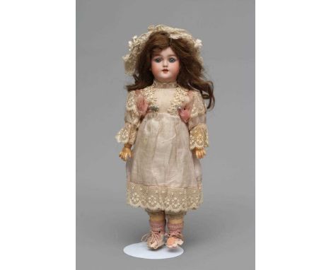 A Simon &amp; Halbig bisque socket head doll, with blue glass sleeping eyes, open mouth, teeth, brown wig, wood and compositi
