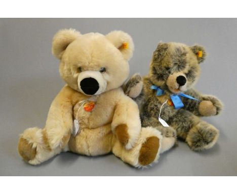 Two Steiff bears, comprising a 14 1/4" "Original" seated bear with light orange plush and a 15" "Molly" bear (Est. plus 24% b