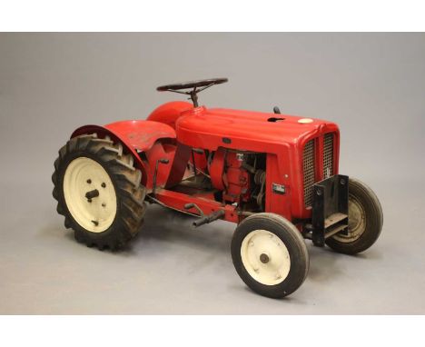 A Trojan miniature petrol driven tractor, produced in 1962 by Trojan, this miniature petrol engine tractor was originally mar