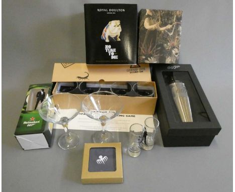 James Bond themed glasses and drink related items including shot glasses, champagne glasses and bulldog figurine, most items 
