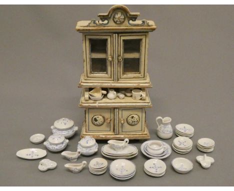 A Victorian doll's house dresser, of painted wood construction, 10 1/4" high, together with a quantity of doll ceramics, main