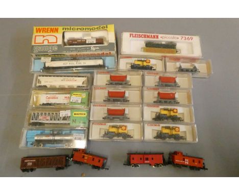 Continental N gauge model trains by Fleischmann and Trix including 7369 electric locomotive, eighteen goods wagons, track and