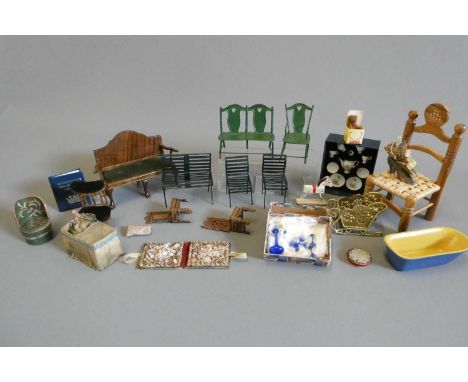 A box of vintage doll's house furniture and accessories, with wood, metal, ceramic examples, including garden furniture, a bo