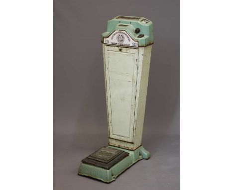 A Watling Scale Co. "Your Weight and Fortune" coin operated machine, of metal construction in two tone mint green, with scale