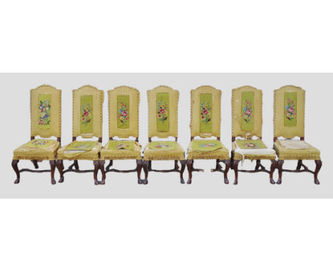 Seven Reformation Style Walnut Dining Chairs - A set of silk and tapestry upholstered high back chairs with carved cabriole f