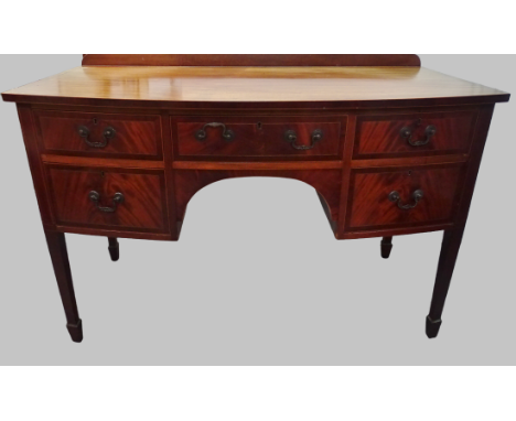 Edwardian Sideboard - A mahogany bow fronted sideboard with an arrangment of five drawers and on spade feet, height 82cm, wid