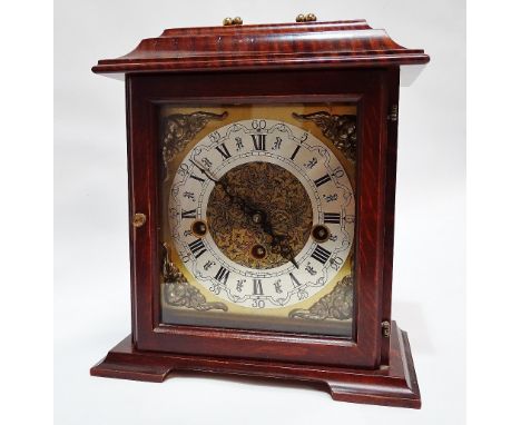 Dutch Bracket Clock - A 20th century Franz Hermle three train musical bracket clock in a mahogany veneered case, striking on 