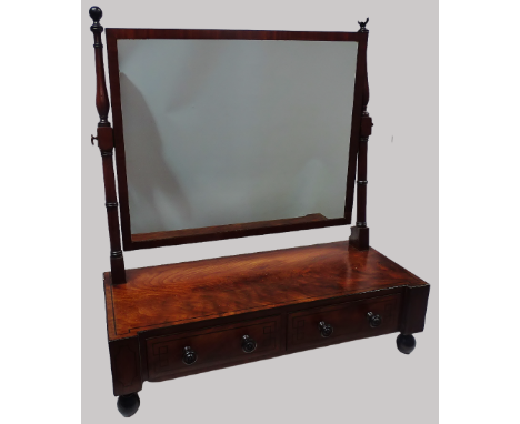 George IV Dressing Table Mirror - A mahogany mirror with turned supports, ebony stringing and with two drawers, standing on t