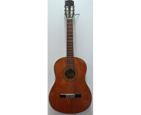 Guitar - A Suzuki vintage classical accoustic guitar with soft shell case, possibly 1960s/70s in gig case, together with an E