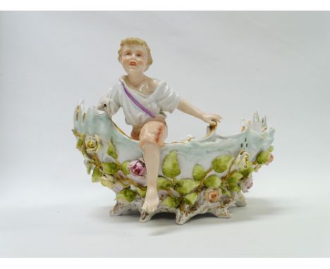 Meissen? - A hand painted ceramic figure and shell bowl, having hand painted decoration of flowers to middle and stamped 'Ger
