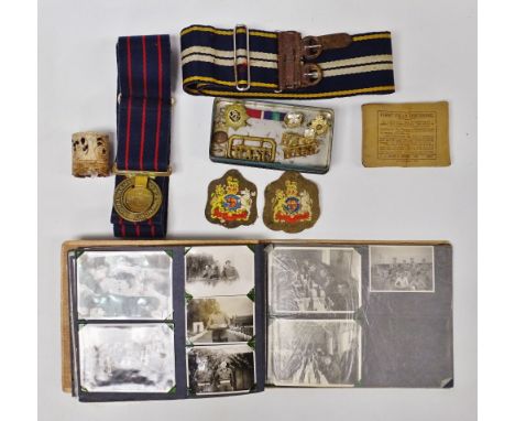 Militaria - A quantity of WWII and later photographs, a Royal Army Ordnance Corps belt, a soapstone firefly container and a F