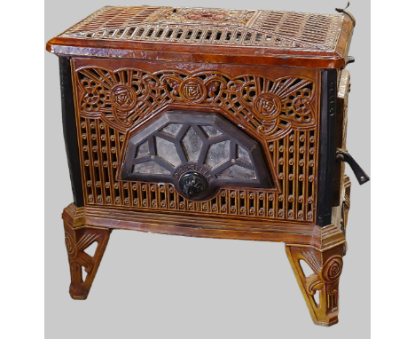 French Enamel Stove - A circa 1900 cast iron stove marked 'Pied-Selle', Noel No.406, decorated with Art Nouveau Glasgow roses
