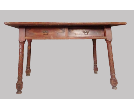 Arts and Crafts - In the manner of Wylie &amp; Lochhead, an oak table with two short drawers to the frieze and barley sugar t