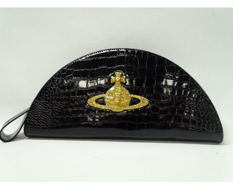 Vintage Fashion - A Vivienne Westwood patent black leather Chancery handbag with large gilt glitter orb motif, black and whit