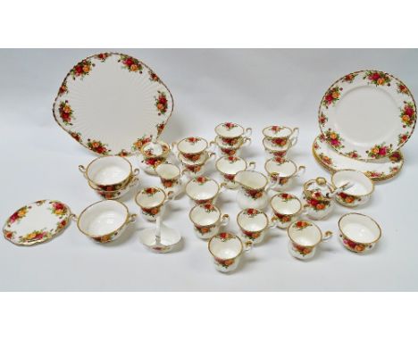 Royal Albert Old Country Roses - A part set comprising, a cake plate, diameter 31.5cm, a teapot stand, a milk jug, a sucrier,