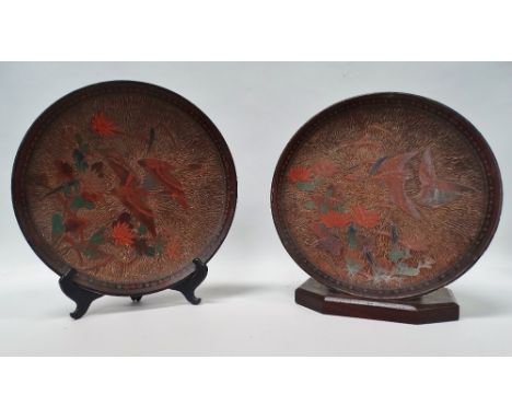 Japanese Chargers - A pair of ceramic chargers with tree bark decoration and cloisonne enamels depicting geese in flight and 
