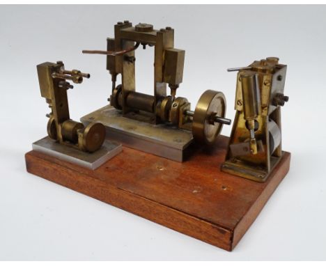 Scale Live Steam Engines - Vickers Armstrong?, three models of brass and aluminium on a mahogany veneered stand, largest heig