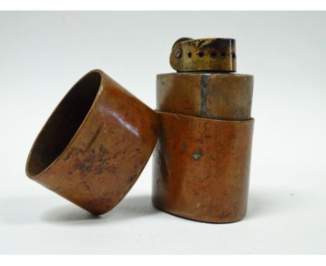 'Tommy' Trenchart Lighter - A WWI copper paraffin lighter, height 6.5cm, width 4.4cm. 